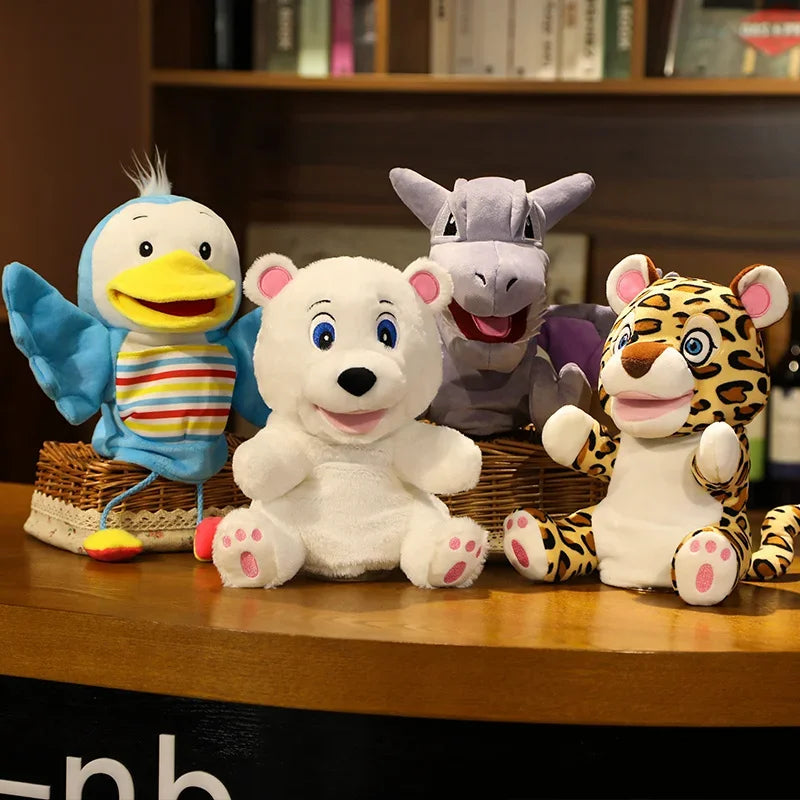 Four colorful animal plush toys on a wooden surface with a bookshelf in the background.
