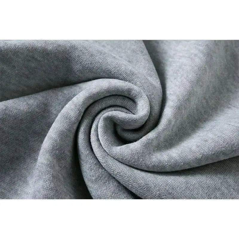 Close-up of gray fabric with a swirl pattern