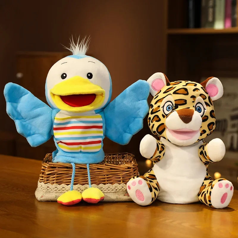 Plush toys of a butterfly and a leopard on a wooden surface with a blurred background.