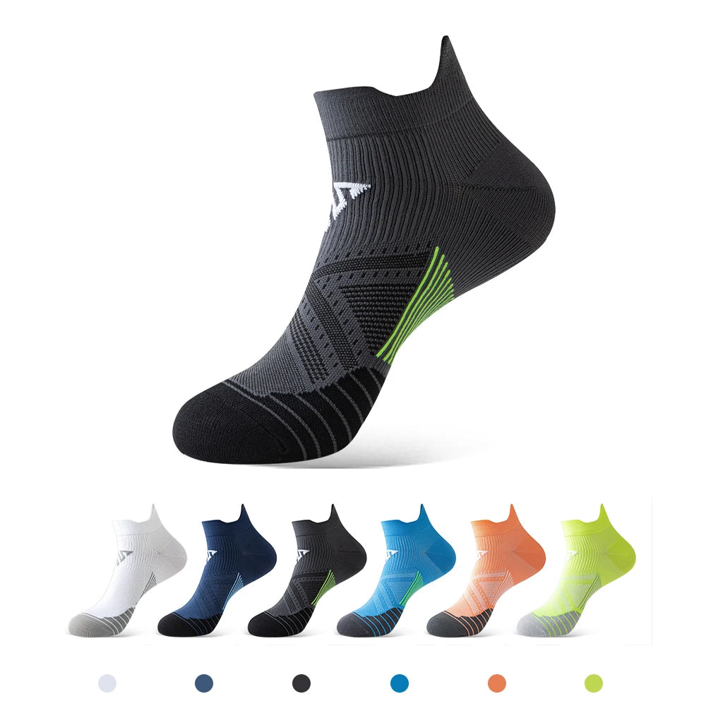 Set of black athletic socks with green accents, displayed with color swatches below on a white background.